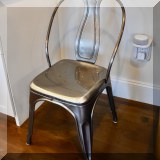 F12. Set of 8 metal dining chairs. 34”h 